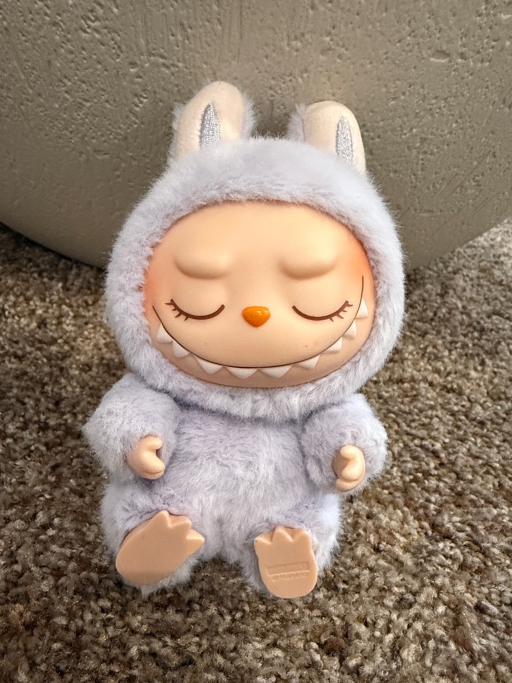 Sleepy Plush Monster Doll in Light Gray with Orange Accent
